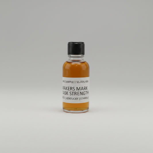Bottle of Maker's Mark Cask Whiskey Sample on a white background