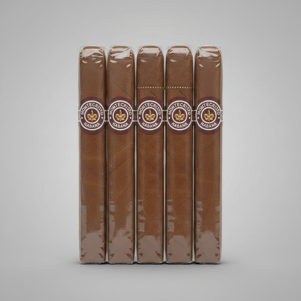5 brown cigar shown vertically against a light gray gradient background, wrapped in clear plastic with a circular band featuring the text 'CIGAR DEL MONTE'.