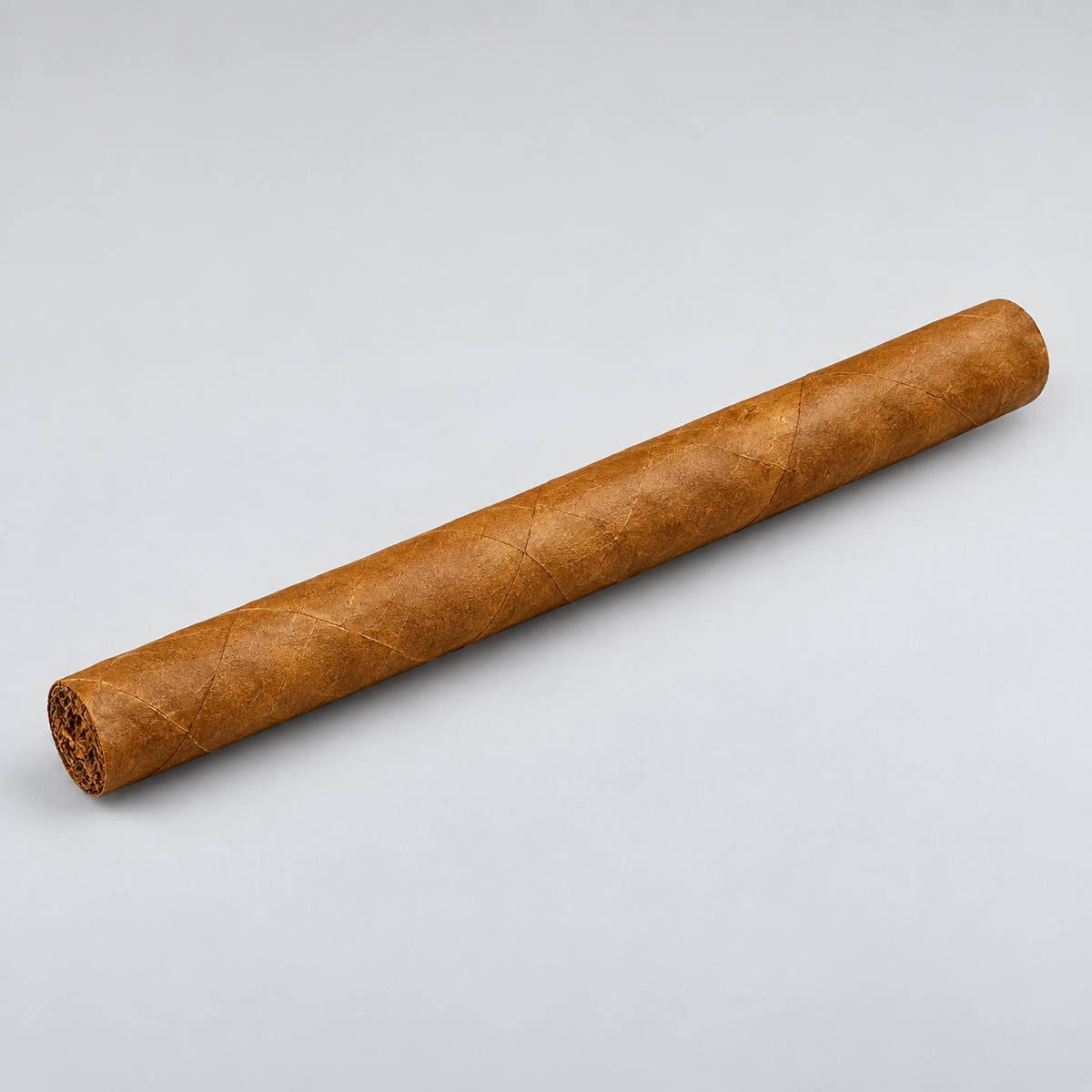 A single brown cigar with a textured leaf wrapper, positioned diagonally on a light gray background.