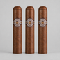 Three Montecristo Haban cigars standing upright in a row against a light gray background. Each cigar has a dark brown wrapper with a circular band featuring the Montecristo logo and the word 'HABAN'.
