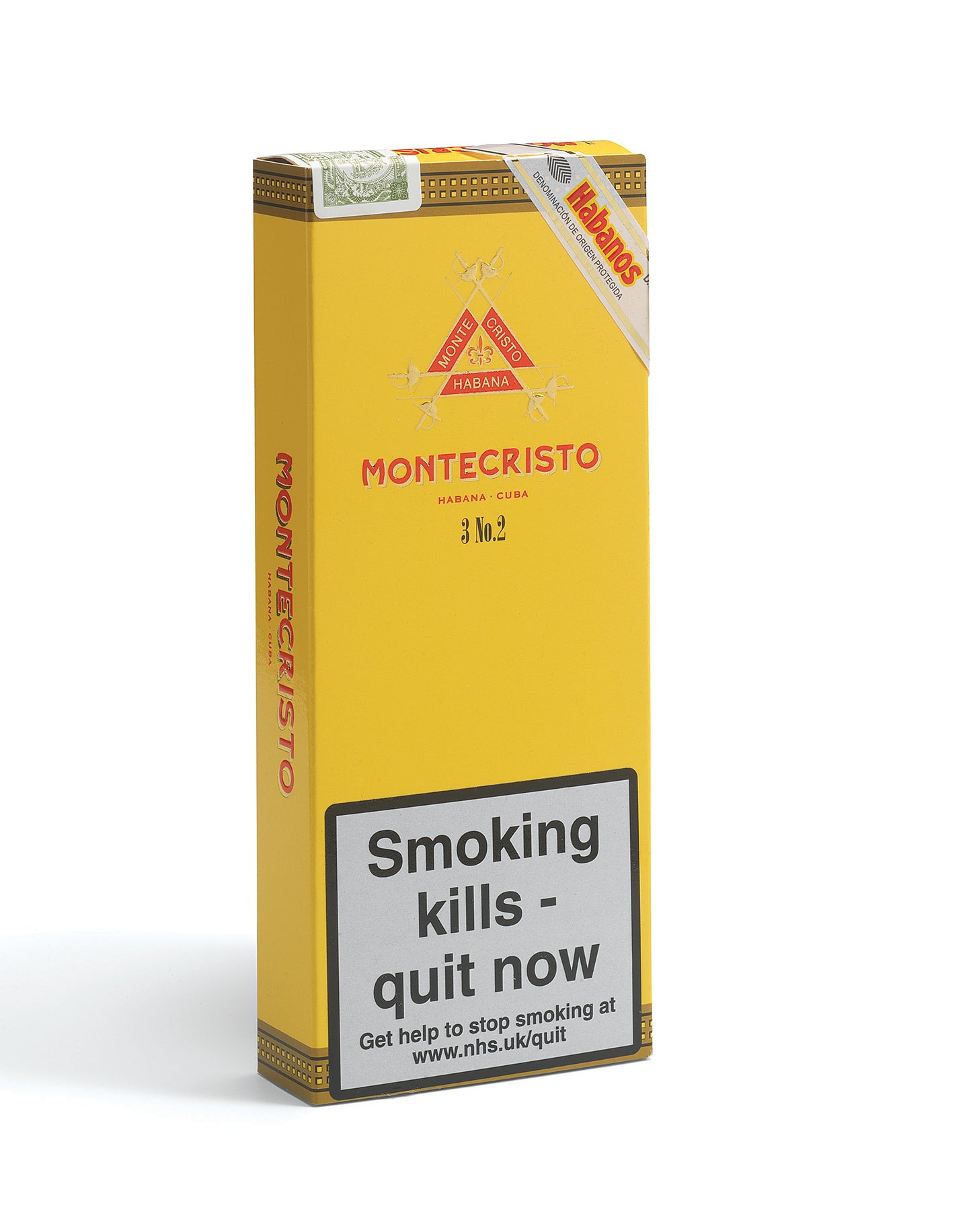 A yellow Montecristo 3 No. 2 cigarette pack with red branding and a prominent smoking-health warning label on the front, photographed on a white background.