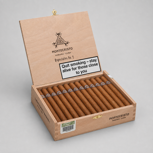 An open Montecristo Habana Clase cigar box on a light gray background, showing multiple brown cigars inside. The wooden box is branded with the Montecristo logo and includes a health warning label on the inside lid.