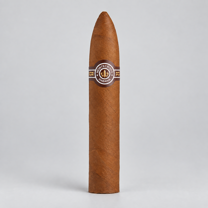 A single brown cigar standing upright on a light gray background, featuring a circular band with the brand name 'Cigarrito de la Mano' and a gold anchor emblem.