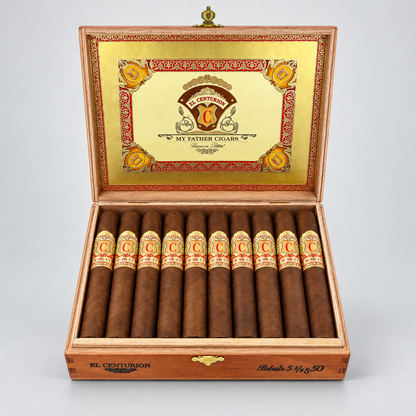 An open wooden cigar box displaying ten cigars inside, with the lid open to show a gold interior panel featuring the El Centurion logo and the text 'My Father Cigars'.