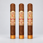 Three brown cigars standing upright on a light gray background, each with a gold and red Century Cigars H-2K-C band around the middle and gold tips at the bottom.