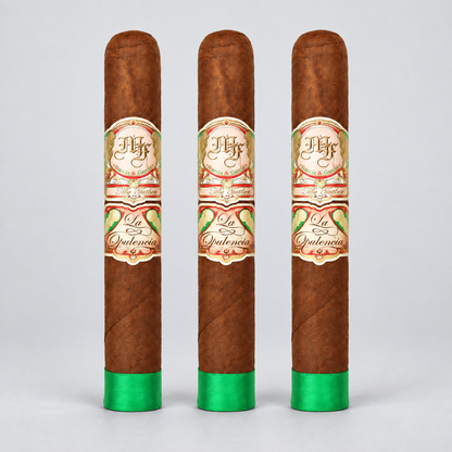 Three brown cigars with ornate cream, red, and green labels reading 'Hjf La Quintencia' stand upright on a light gray background.