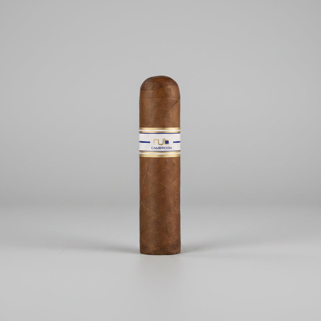 Cigar with a visible brand label on a reflective surface