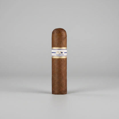 Cigar with a visible brand label on a reflective surface