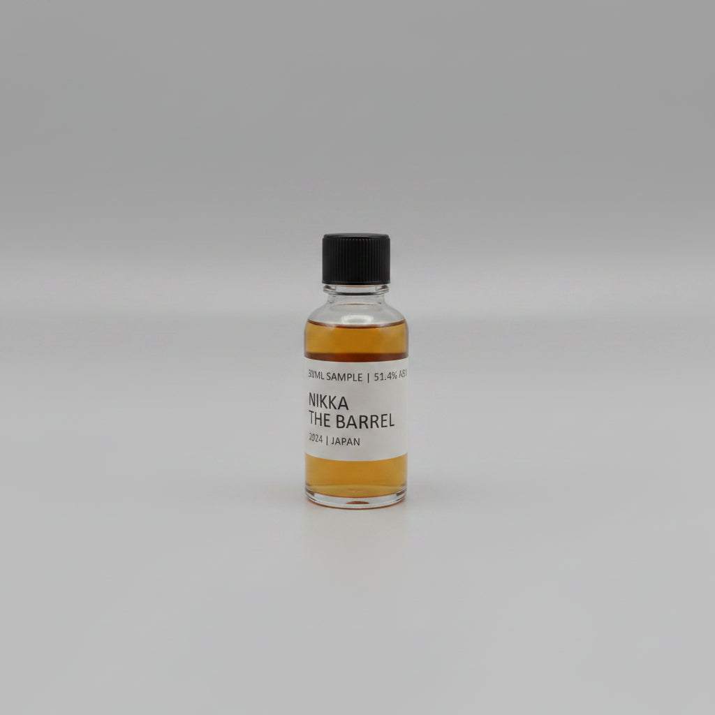 Small bottle of Nikka whisky with a label on a white background