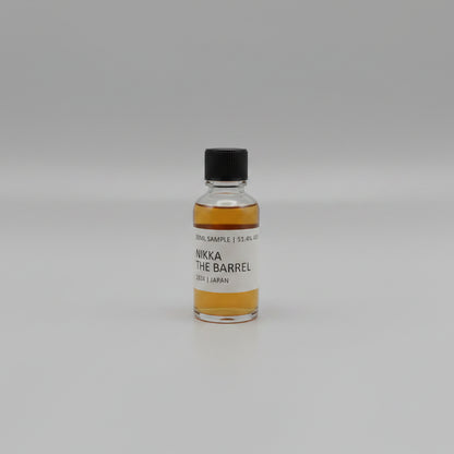 Small bottle of Nikka whisky with a label on a white background