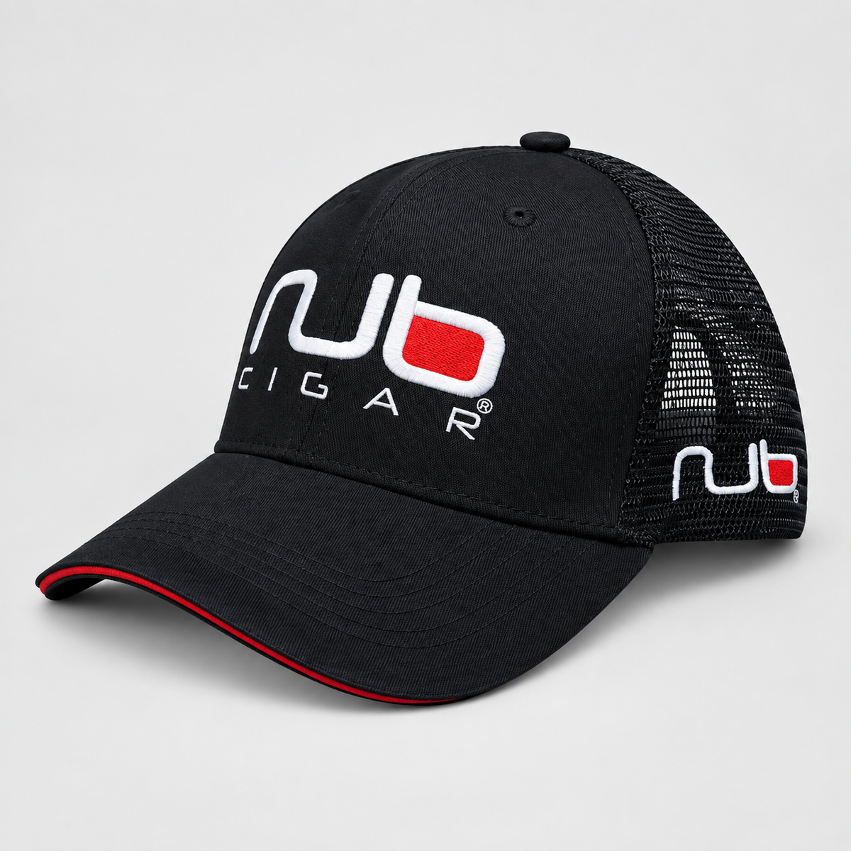 A black trucker-style cap with a curved brim, black mesh back panels, and white and red logo embroidery. The front features the text 'nub CIGAR' in white with a red accent block, and a matching side logo is visible on the mesh.