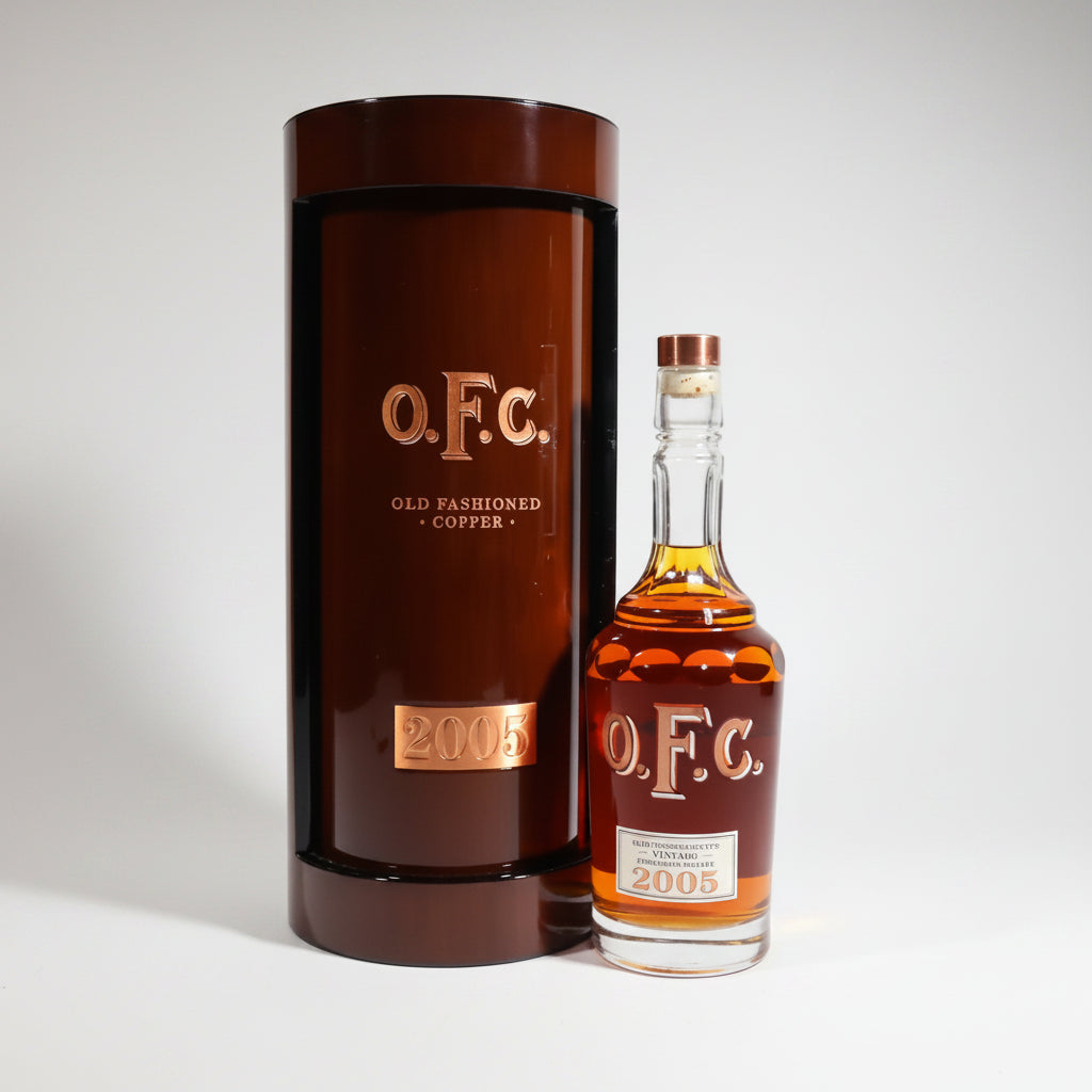 O.F.C. whiskey bottle and packaging on a white background