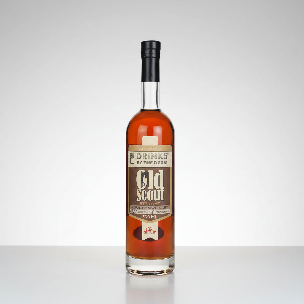 A bottle of Old Scout Straight Bourbon Whiskey with amber liquid, a brown label, and a black cap, shown on a white background with a reflection.
