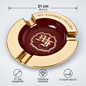 A round gold and dark red ceramic cigar ashtray with the text 'MY FATHER CIGARS' and a monogram crest in the center. The image includes dimension markers showing 21 cm (8.