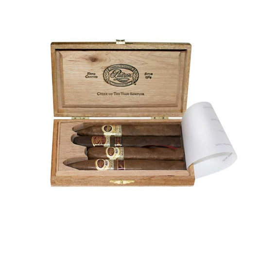 Wooden humidor with cigars and a lighter on a white background
