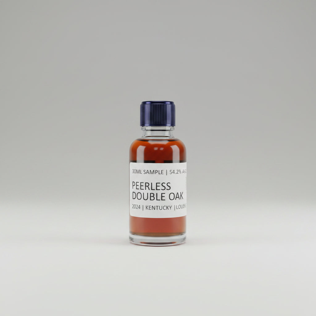 Bottle of Peerless Double Oak bourbon on a bar with other bottles in the background.