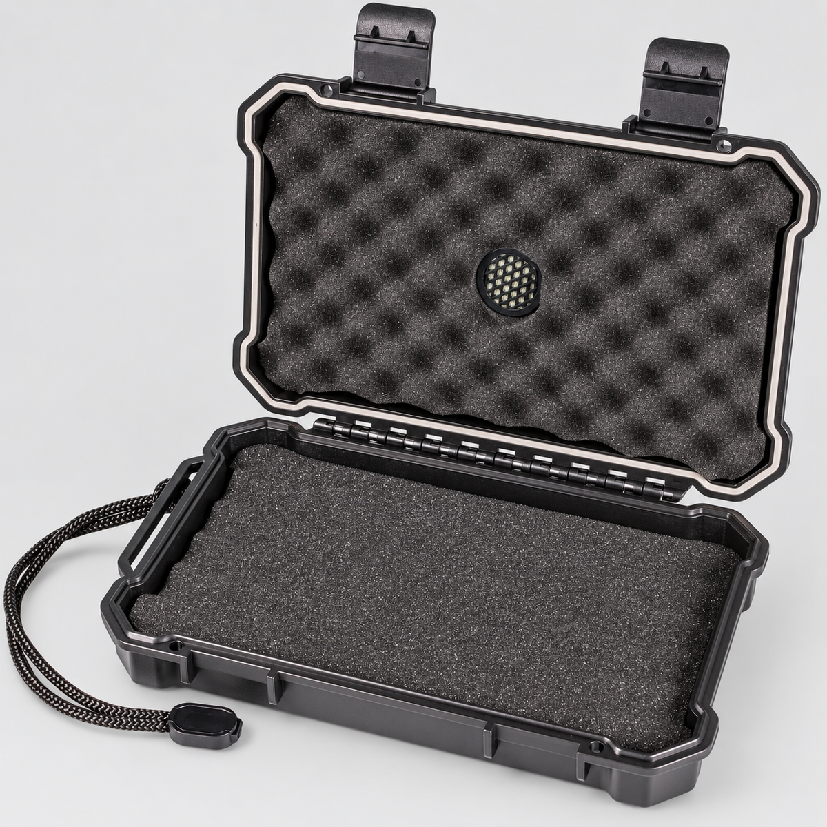 An open black hard protective case with custom black foam padding inside, shown on a light gray background.