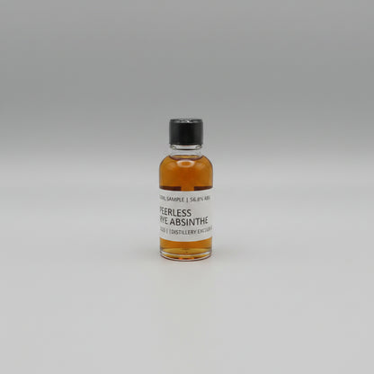 Small bottle of Peerless Rye Absinthe on a white background