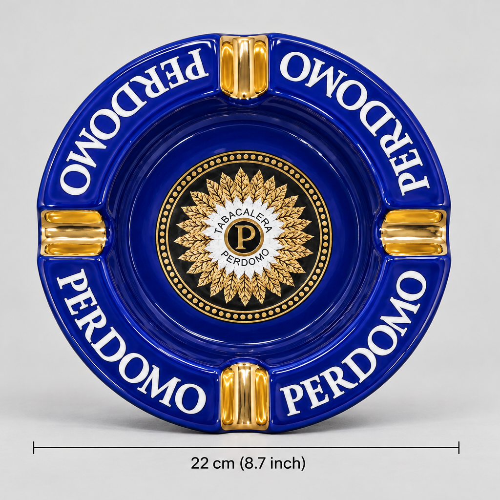 A round blue and gold ceramic Perdomo ashtray with a dimension marker indicating a diameter of 22 cm (8.7 inches) on a light gray background.