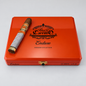 A red cigar presentation box with a gold clasp, featuring the black printed logo 'Perez Carrillo Endure Premier Collection' and a single cigar placed diagonally on top, photographed on a light gray background.