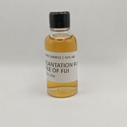 Small bottle of Plantation Rum Isle of Fiji on a gray background