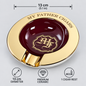 A round cigar ashtray with a polished gold outer rim and a glossy dark red center, shown on a light gray background with measurement and feature callouts. The rim reads 'MY FATHER CIGARS,' and the center has a decorative crest with the letters 'AF.