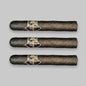 Three dark brown cigars with decorative bands, arranged horizontally in a row against a solid gray background.