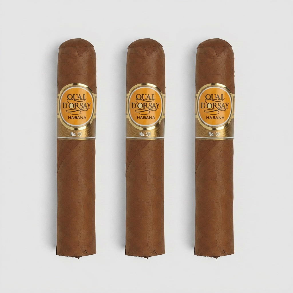 Three brown cigars with gold and orange labels reading 'QUAI D'OR SAY HABANA' arranged vertically on a light gray background.
