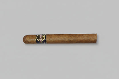 Cigar with a visible brand label on a gray background