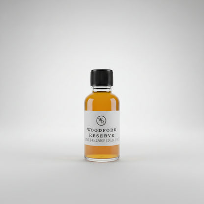 Bottle of Woodford Reserve Rye whiskey on a bar counter with a pool table in the background