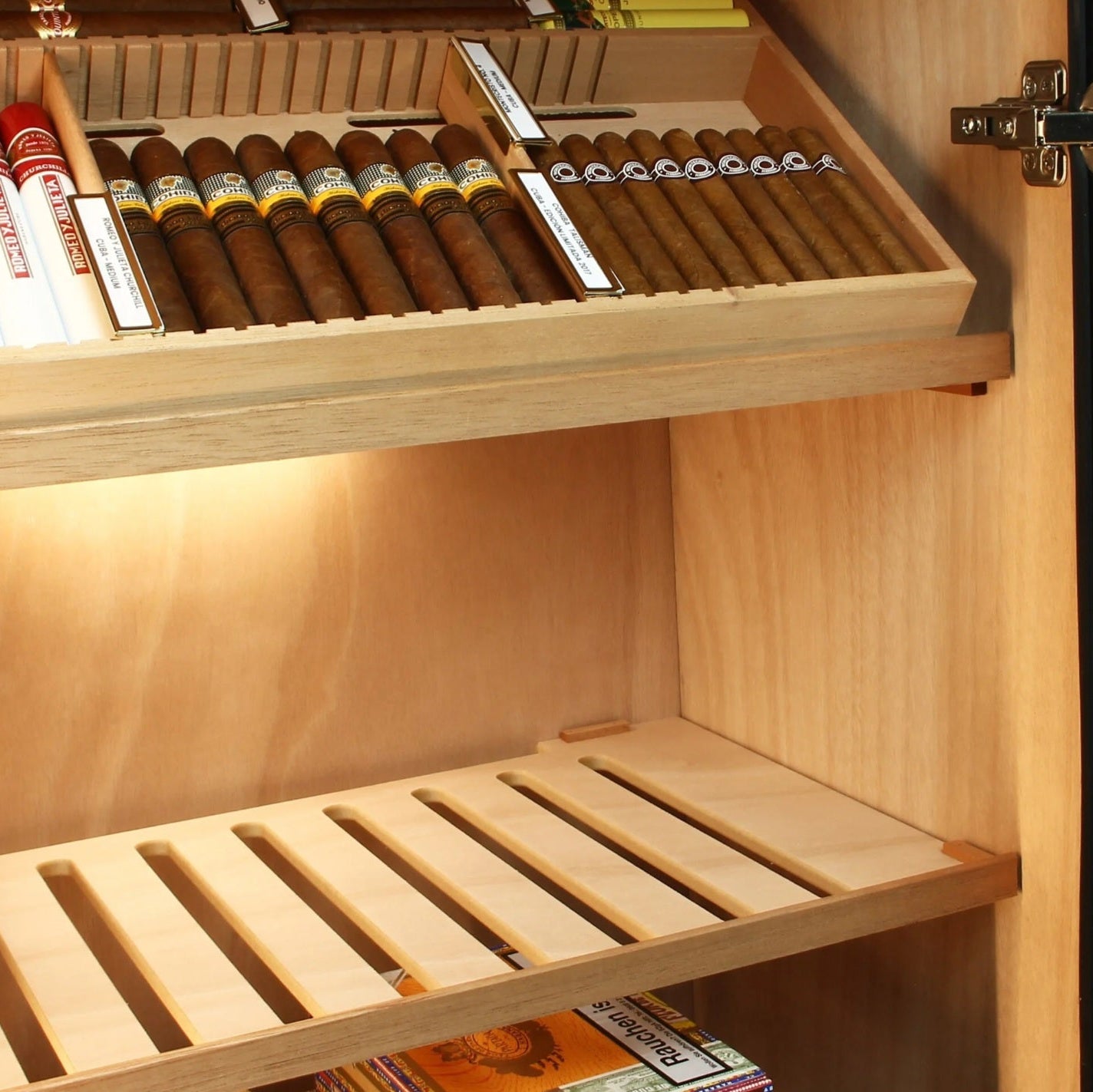Wooden humidor with cigars and cigarillos inside