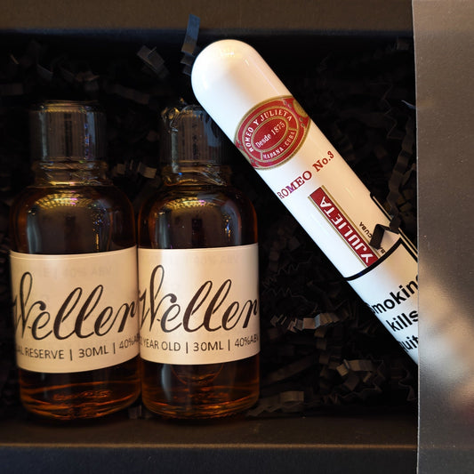 Two bottles of Weller bourbon and a Romeo Y Juliet No.3 cigar in a black box on a white background 