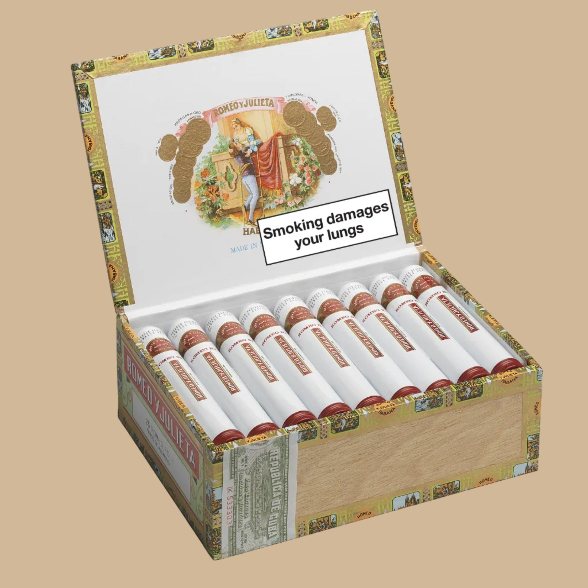 Open box of Romeo y Julieta no.2 cigars with a warning label on a white background