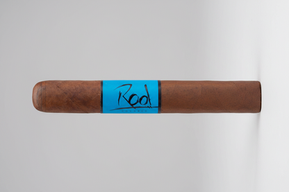 Cigar with blue band labeled 'Rook' on a white background