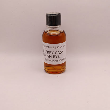 Small bottle of Sherry Cask Finish Rye on a light gray background