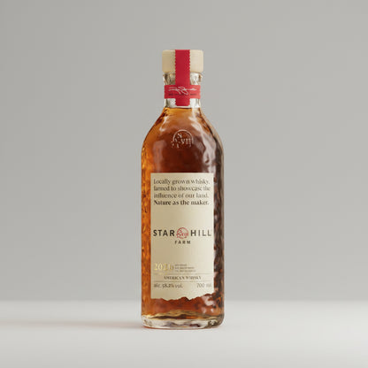 Bottle of Star Hill Farm American Whisky on a white background