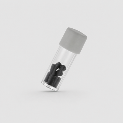 A clear cylindrical vial with a matte gray screw cap, shown at an angle on a light gray background. Inside the vial are several dark gray to black cylindrical pieces.