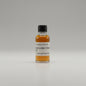 Small bottle of rum cask finished whiskey  on a white surface.