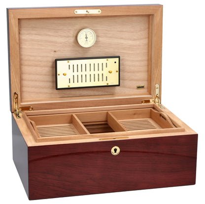 Wooden humidor with interior compartments and a hygrometer on a white background
