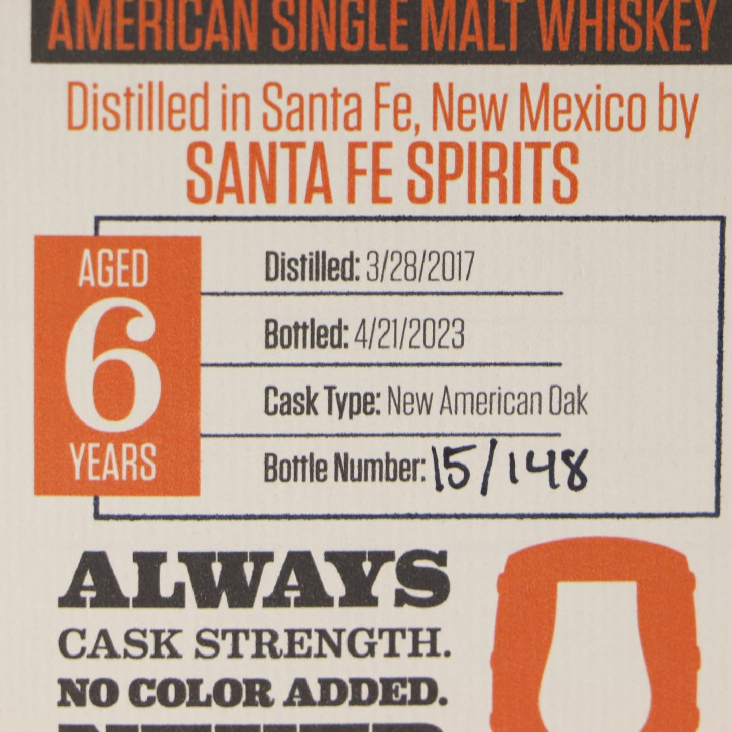 Label of American single malt whiskey from Santa Fe Spirits with aging details and bottle number.