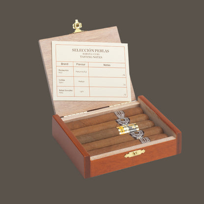 Wooden cigar humidor with cigars and tasting notes card on a white background