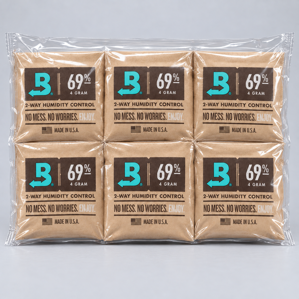 Six packs of Boveda 69% 4 gram 2-way humidity control packets arranged in a 2x4 grid inside a clear plastic clamshell package on a light gray background.