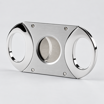 A polished stainless steel cigar cutter with a brushed metal center blade and four visible screws, shown on a clean light gray background.