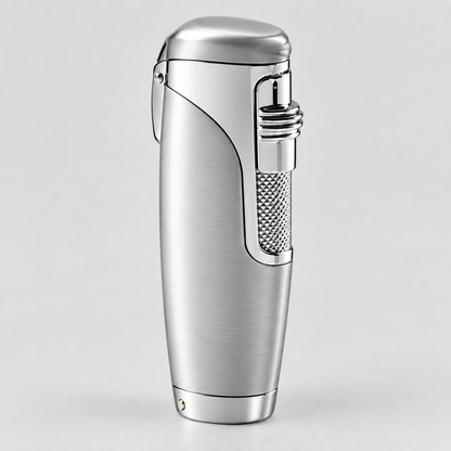 A sleek, metallic silver lighter with a brushed metal finish, featuring a textured mesh window and a polished button, set against a neutral light gray background.