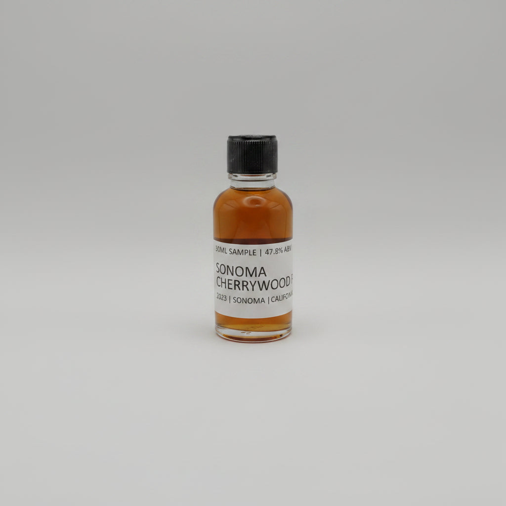 Small bottle of Sonoma Cherrywood on a white background