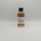 Small bottle of Springbank whisky sample on a gray background