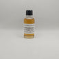 Small bottle of Springbank 10 Year Old whisky sample on a gray background