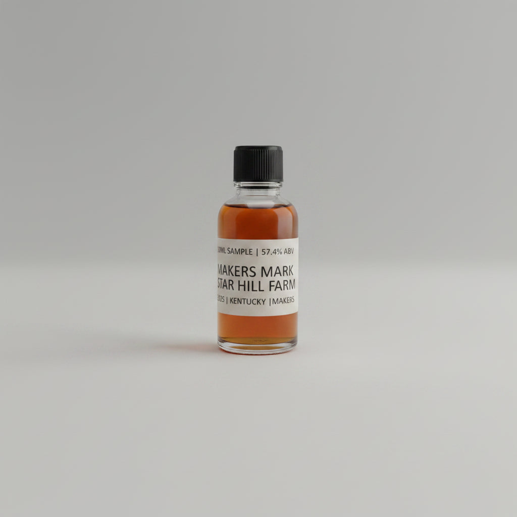 Small bottle of Maker's Mark bourbon on a white surface with a textured gray background