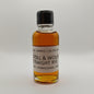 Small bottle of Stoll & Wolf Straight Rye whiskey sample on a white background