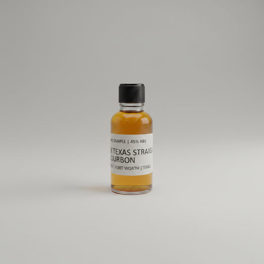 Small bottle of TX Bourbon on a white background